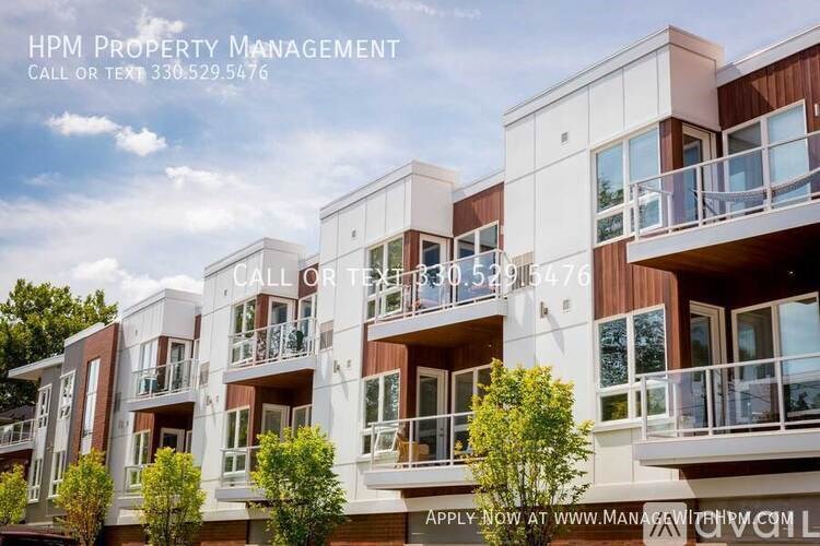 A building with the text "HPM Property Management" on it.