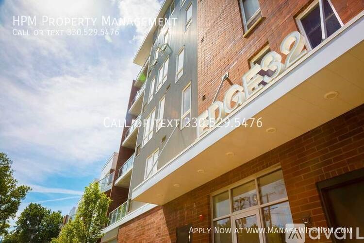 A building with the text "HPM PROPERTY MANAGEMENT" on the side.