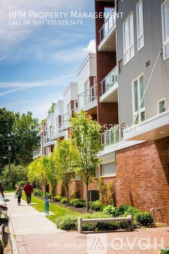 A building with the text "HPM PROPERTY MANAGEMENT" on the side.