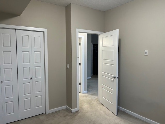 A room with two white doors and a carpeted floor.