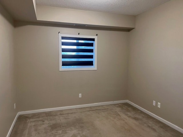 A room with a window covered by horizontal blinds.