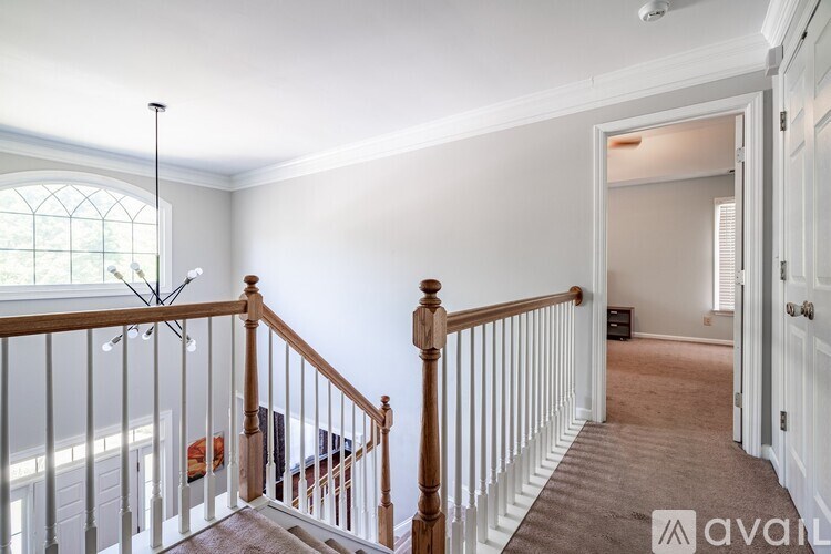 A room with a staircase leading to the second floor.