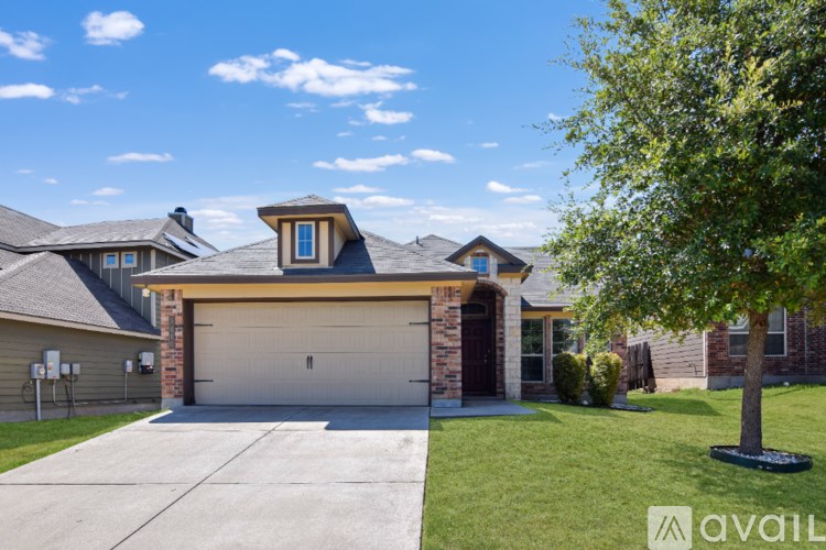 A room with a table and chairs is visible through a glass door.