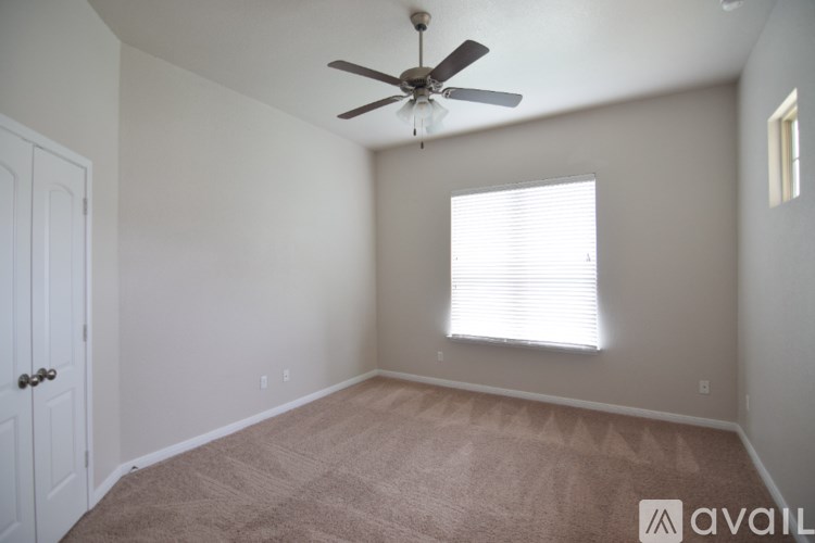 A bathroom with a sink, toilet, and bathtub.