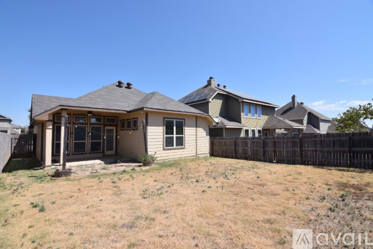 A white door is on the left and a white shelf is on the right.