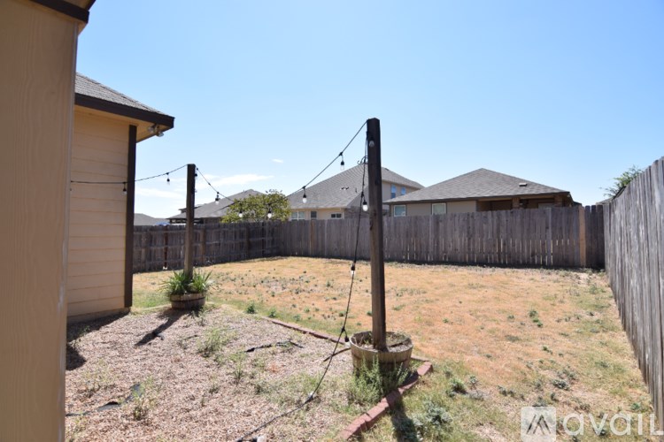 A kitchen with a counter and a sink.
