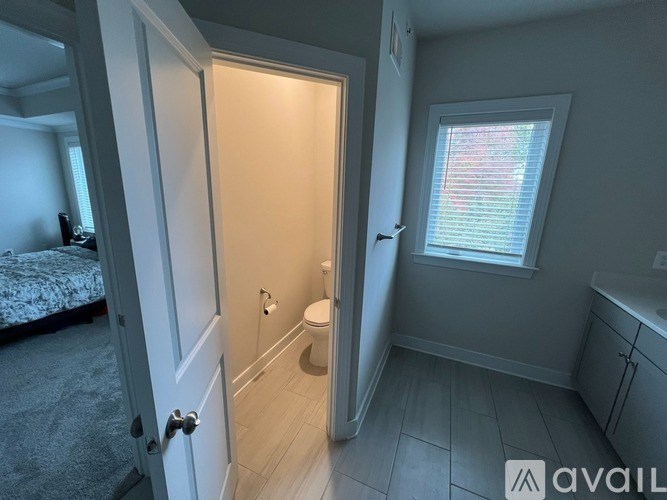 A small bathroom with a toilet and sink.