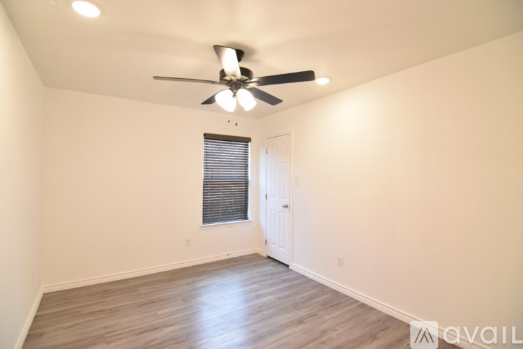 A house with a brown fence and a brown roof.