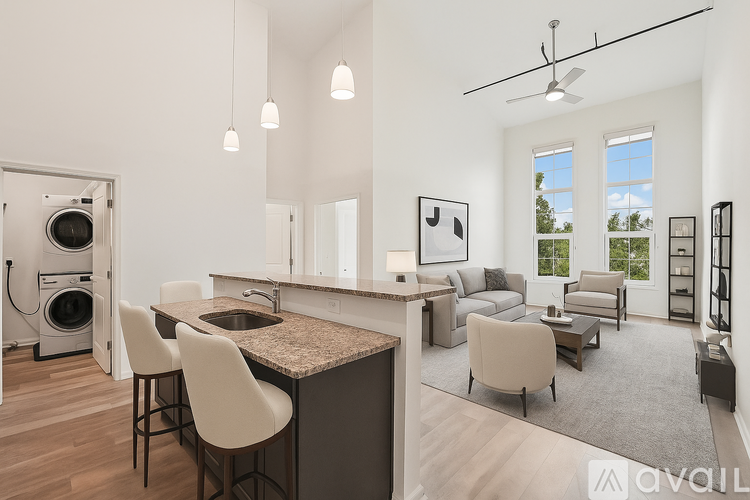 A kitchen with a stove, oven, and refrigerator.