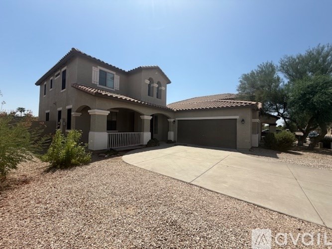 A house with a driveway and a garage.