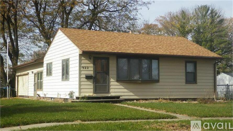 A house with the number 323 on it.