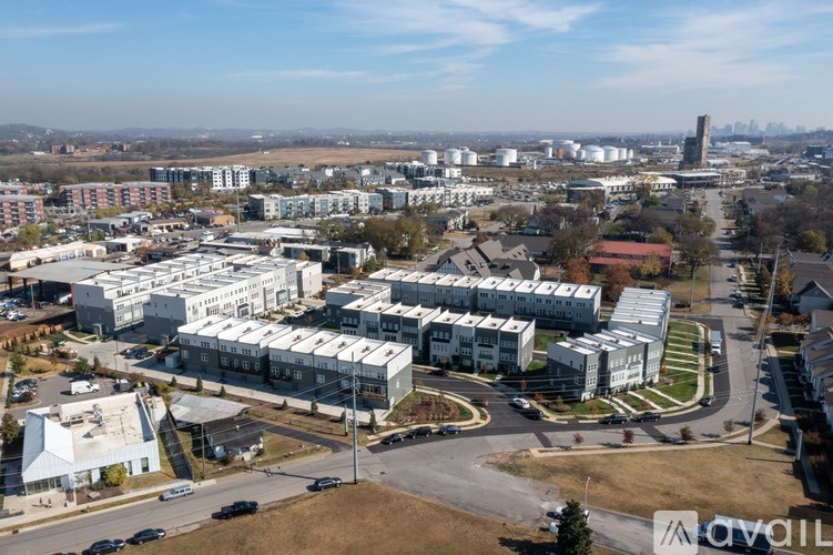 A large industrial area with buildings and a road.