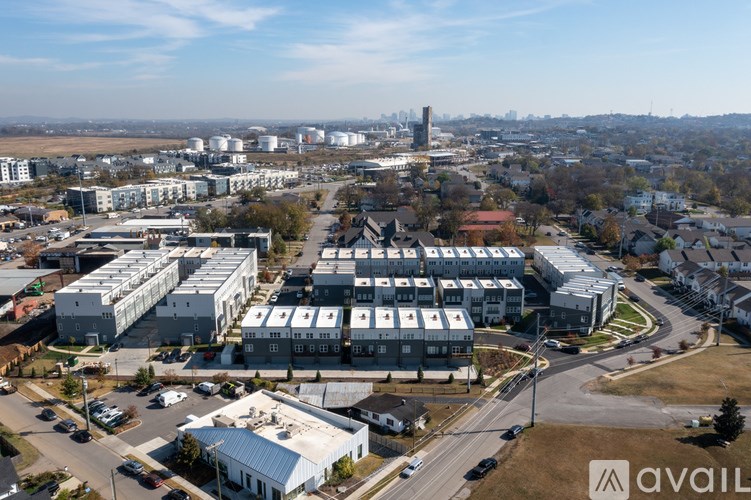 An aerial view of a city with buildings and roads.