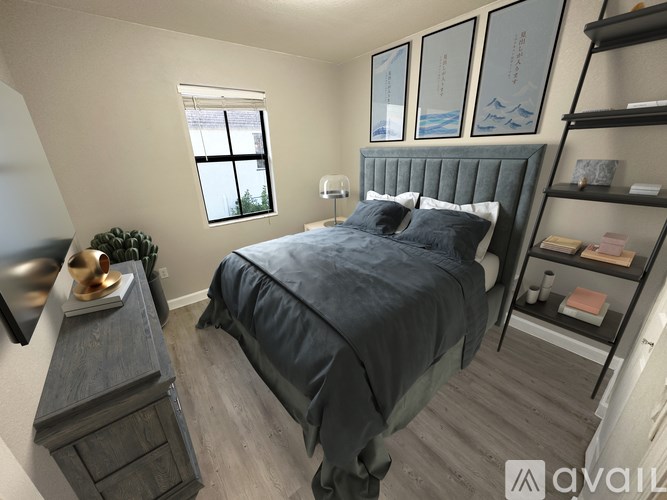 A bedroom with a bed, nightstand, and a shelf with books.