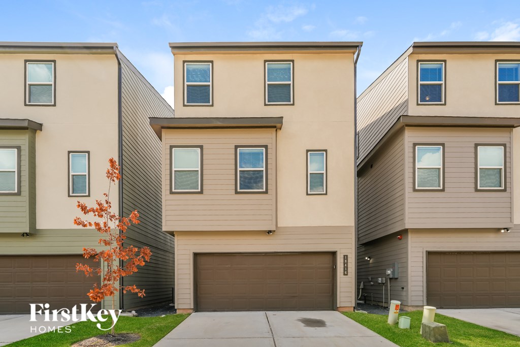 A row of houses with the logo "FirstKey Homes" on the bottom left.