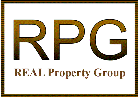 A brown and white logo for the REAL Property Group.