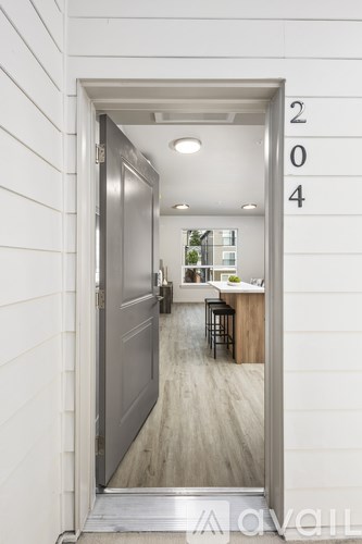 A hallway with a number 204 on the wall.