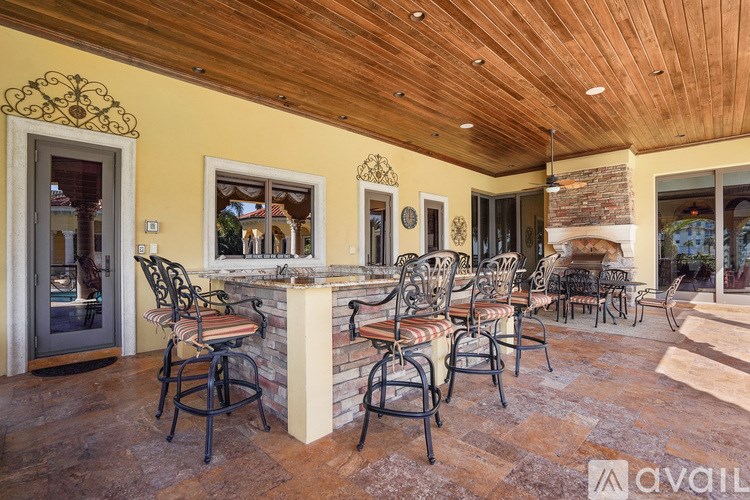 A patio with a table and chairs is available for rent.