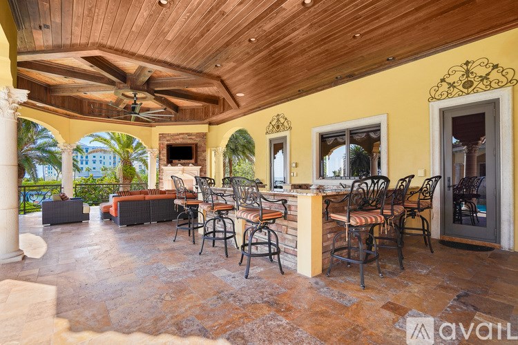 A patio with a table and chairs is available for rent.