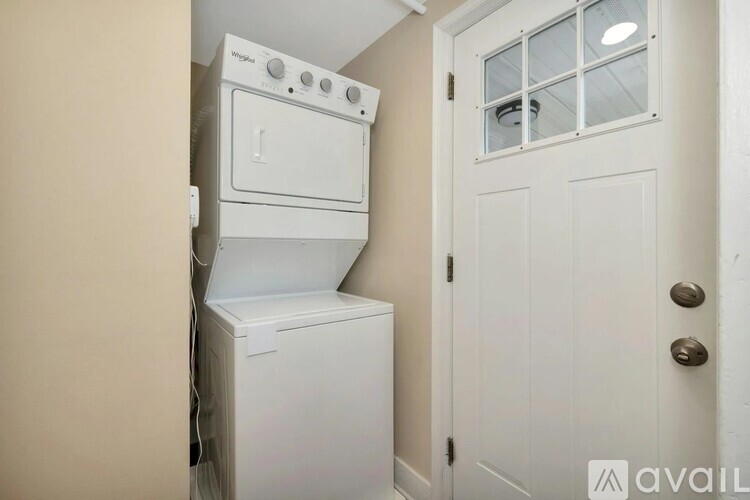 A white dishwasher is installed in a kitchen.