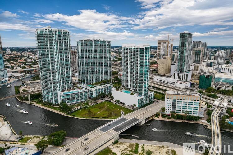 A cityscape with a river running through it.