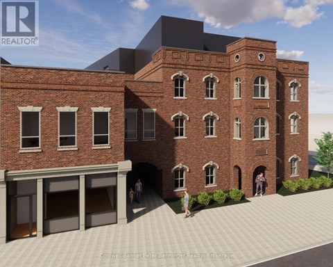 A rendering of a red brick building with a black roof and a courtyard in front.