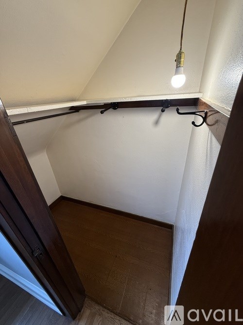 A light bulb is turned on in a small room.