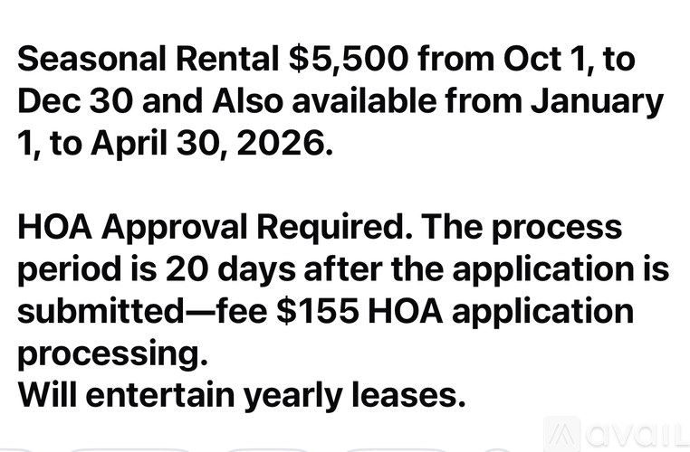 A living room with a couch and a coffee table.