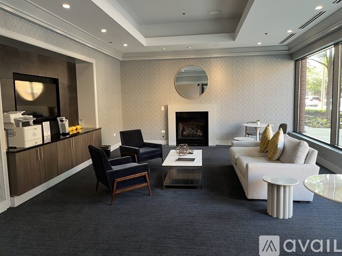 A living room with a fireplace and a couch.