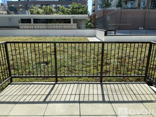 A pool table with balls and a cue stick on it.