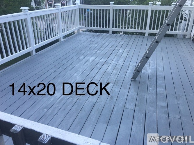A wooden deck with the dimensions 14x20 DECK.