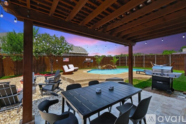 A small residential pool in a backyard.