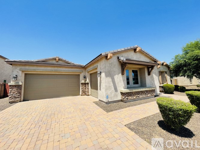 A house with a driveway in front of it.