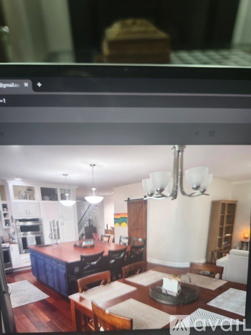 A white closet with a shelf and drawers.