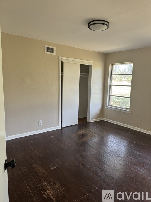 A room with a door and a window.