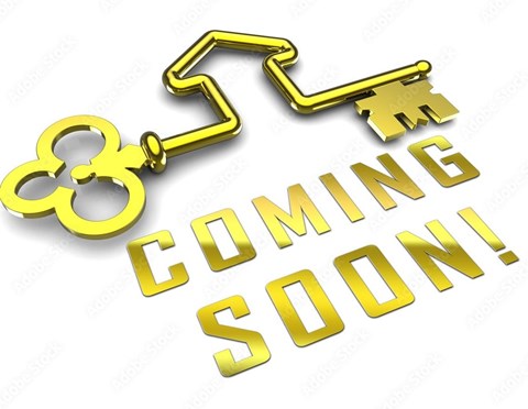 A golden key with a keychain attached is positioned above the words "COMING SOON!" in a 3D style.