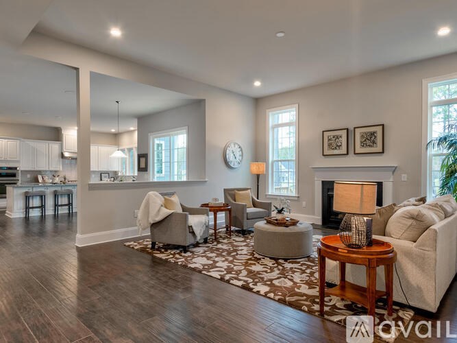 A living room with a fireplace and a couch.