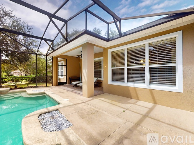 A house with a pool and a glass roof.