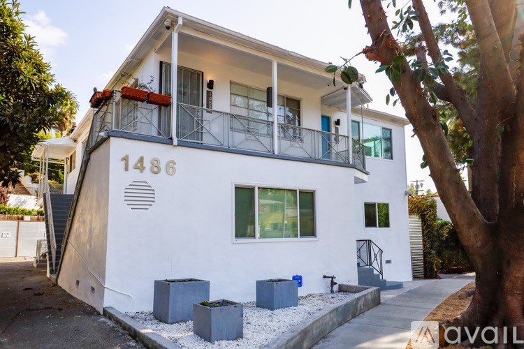 A white house with the number 1486 on the front.