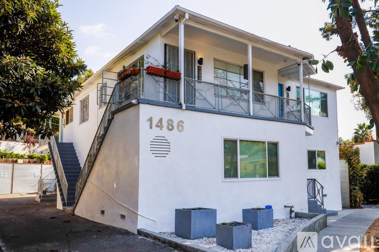 A white house with the number 1486 on it.