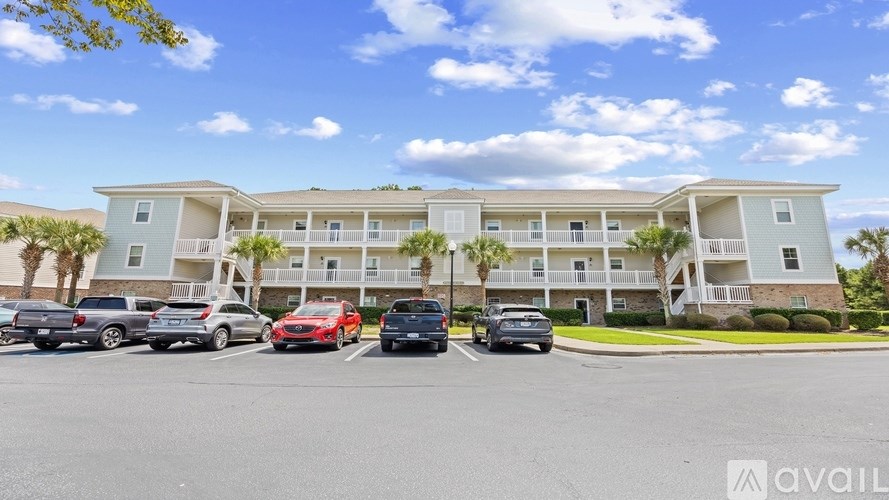 A row of cars parked in front of a building with the word "available" on the bottom right.