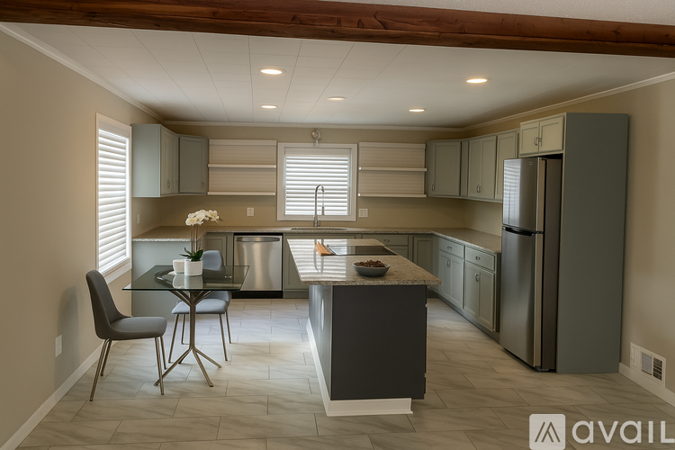 A kitchen with a table and chairs in front of a refrigerator.