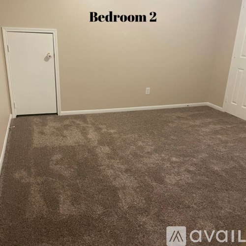 Bedroom 2 is empty and waiting to be furnished.