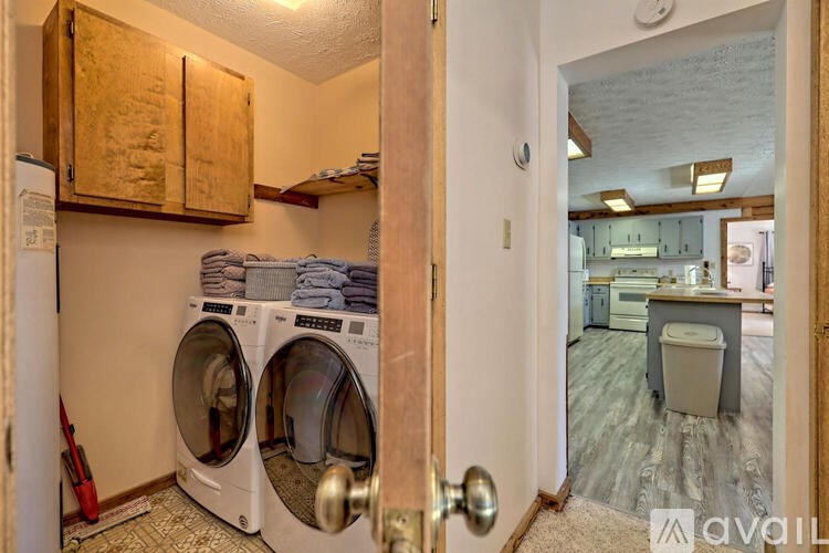 A laundry room with a washer and dryer.