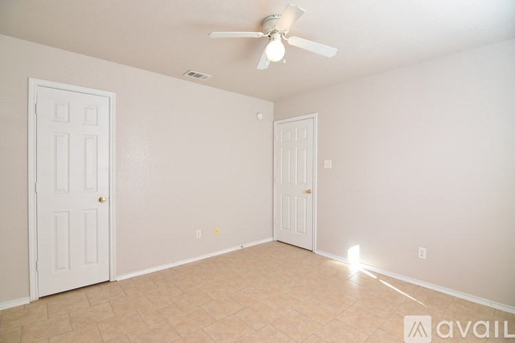 A bathroom with a sink, toilet, and bathtub.