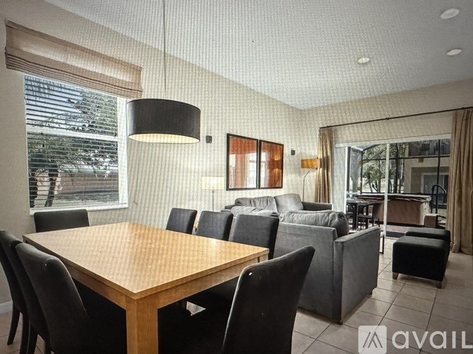 A small laundry room with a washer and dryer.