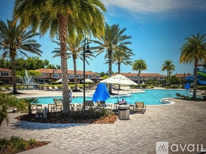 A playground with a green slide and a yellow slide.