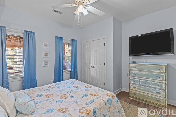 A long hallway with a door on the right.