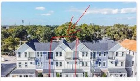 A building with a red line drawn across it.