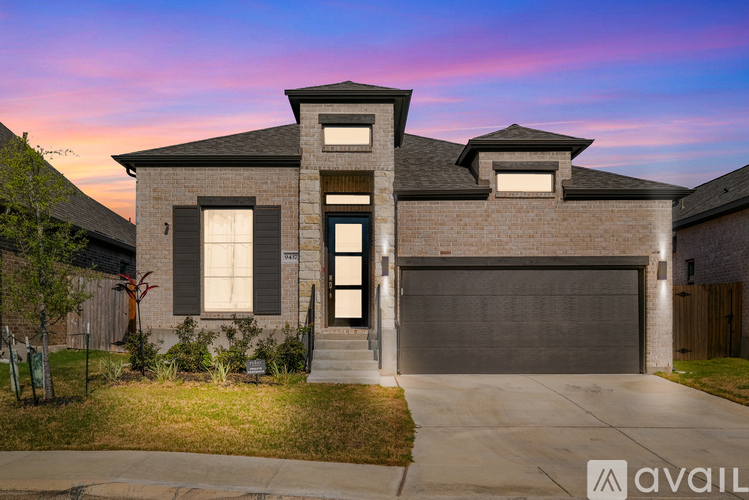 A house with a garage is available for sale.